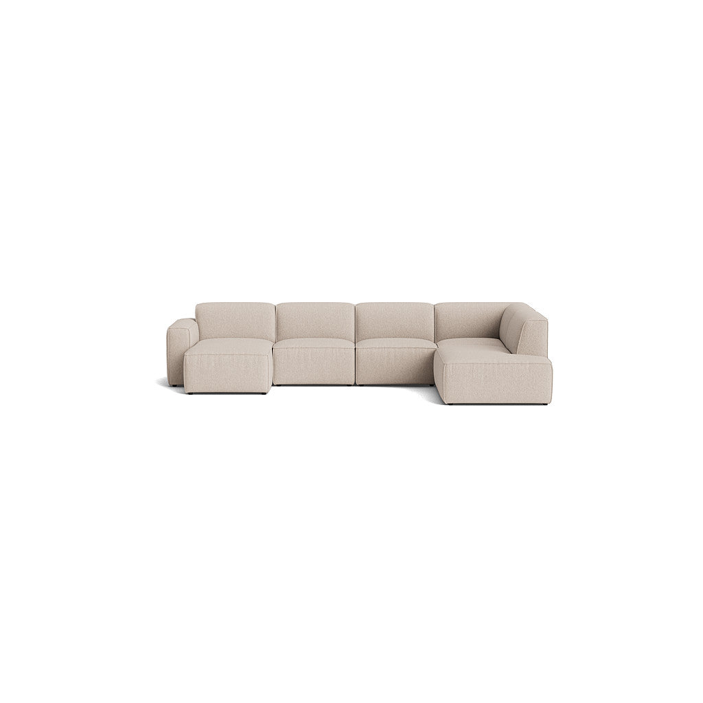 Element modulsofa i lys beige, U-form med chaiselong for komfort og stil.