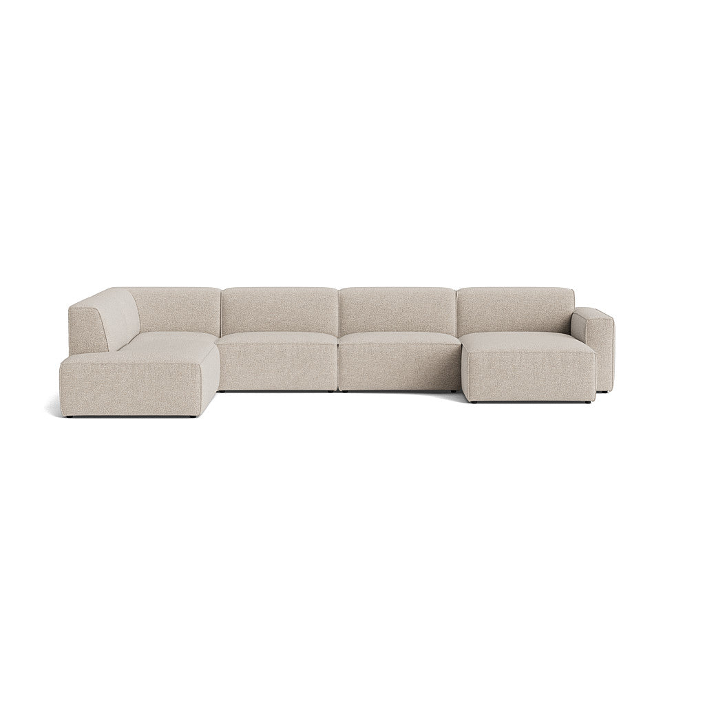 Element Roomy modulsofa i lys farve med open end og chaiselong, designet for komfort og elegance.